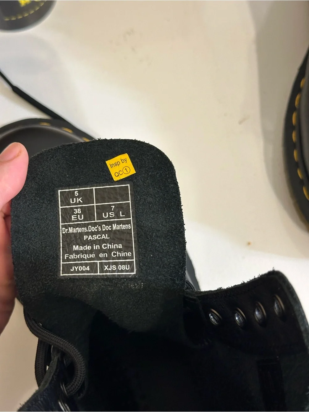 Dr. Martens Black Leather 8-Eye Boots with Yellow Stitching